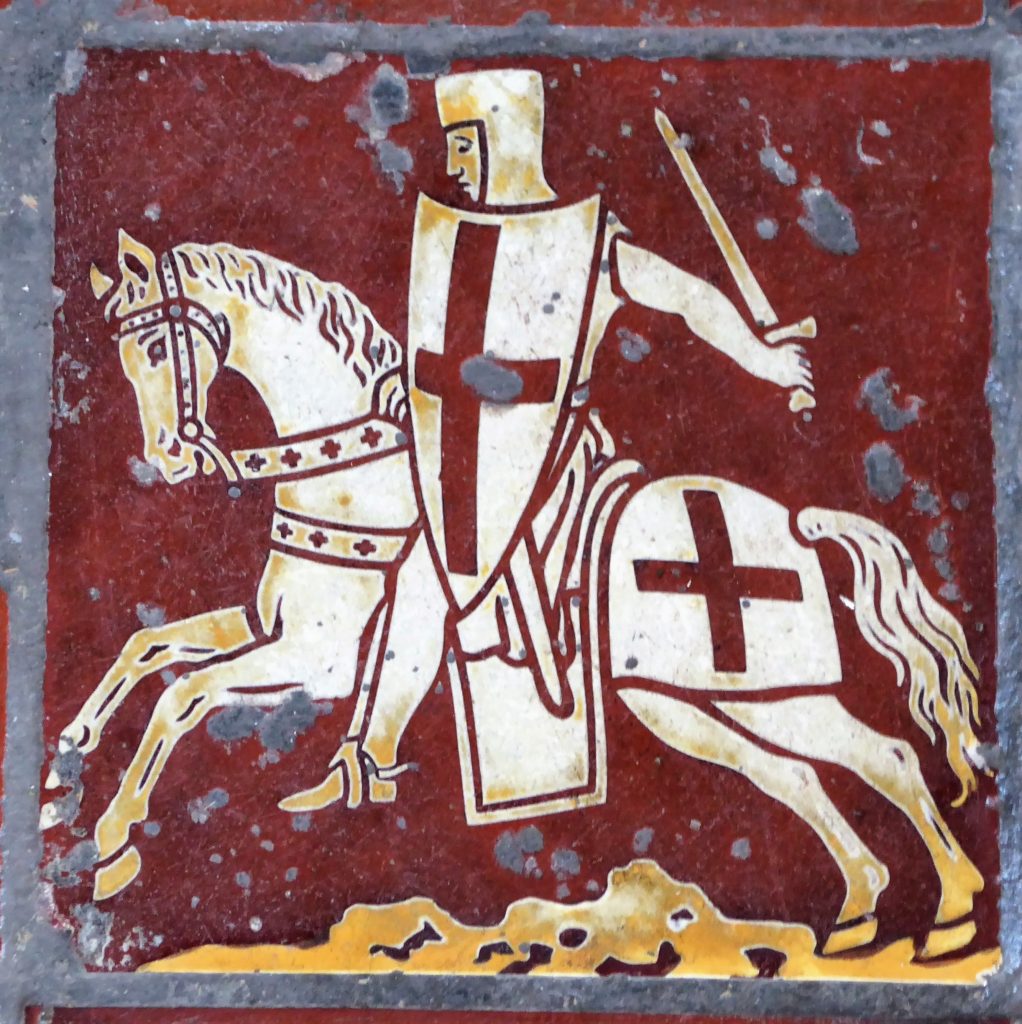 Peças de xadrez de vidro coloridas em tons brilhantes representando cavalos,  cavaleiros e rei em um tabuleiro de xadrez
